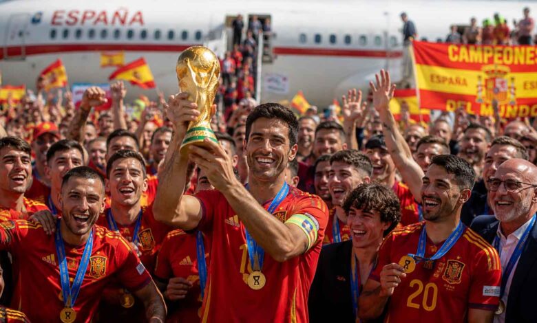 Spain captain Rodri proudly holds the FIFA World Cup trophy as the Spanish team arrives in Madrid after winning the FIFA World Cup 2026.