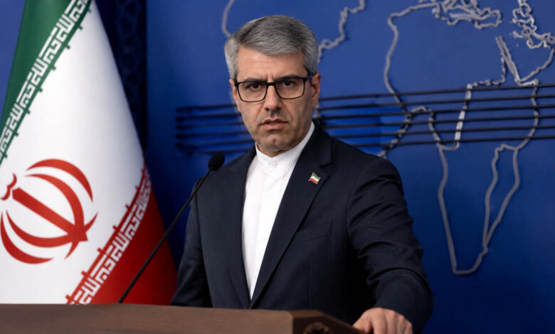 Iranian Foreign Ministry spokesperson Esmail Baghai addressing the media while discussing Iran-US diplomatic contacts.