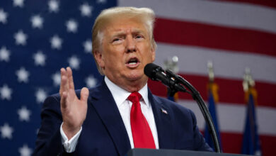 US President Donald Trump speaking during a public event in Michigan while discussing Iran and US foreign policy.